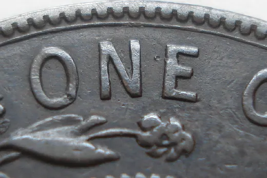 Re-engraved O in (ONE)