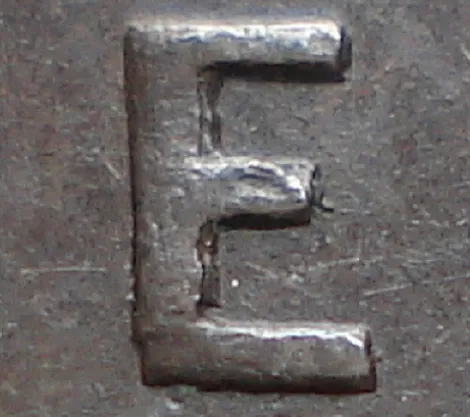Re-engraved E in ONE