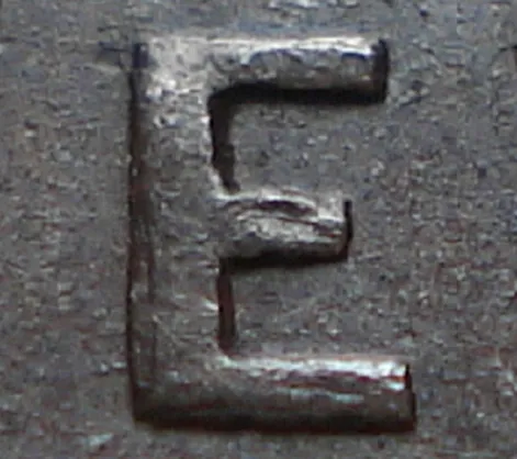 Re-engraved E in NEWF