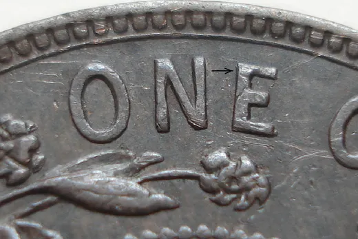 Re-engraved N & E in ONE