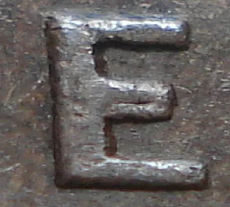 Re-engraved E in NEWF