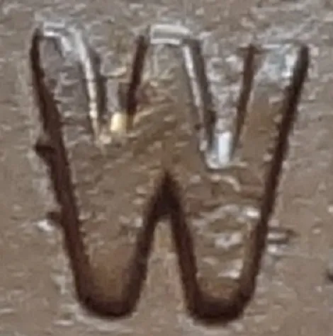 Re-engraved W in NEWF