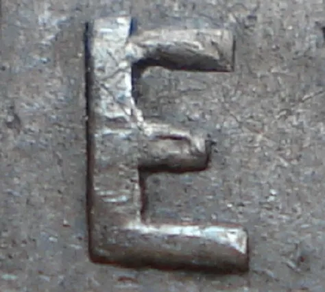 Re-engraved E in NEWF