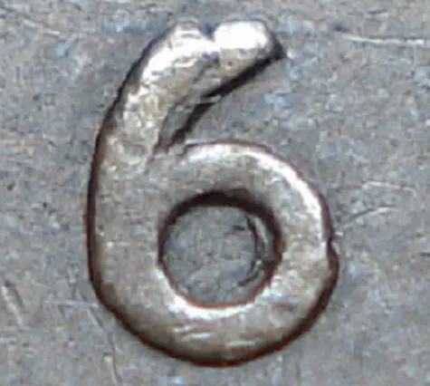 Repunched Short 6 over Tall 6