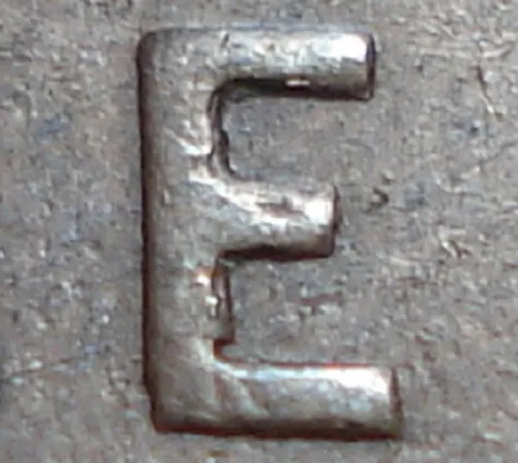 Re-engraved E in ONE