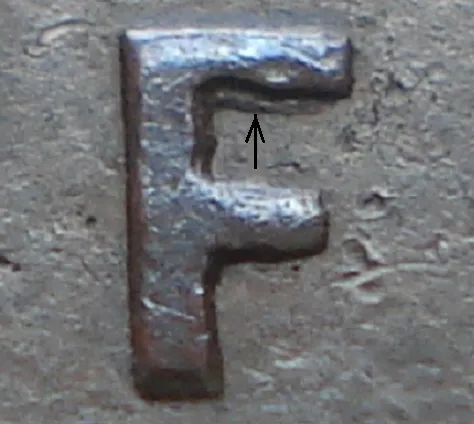 Re-engraved F in NEWF