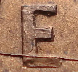 Re-engraved E in NEWF