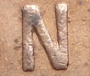 Re-engraved N in (ONE)
