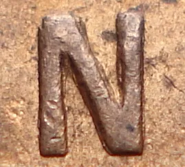 Re-engraved N in OUND