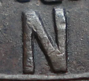 Tall, Re-engraved N in LAND