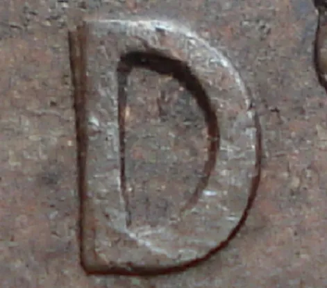 Re-engraved D in LAND