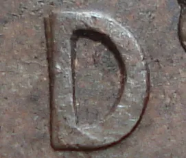 Re-engraved D in LAND