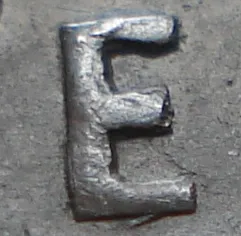 Re-engraved E in NEWF