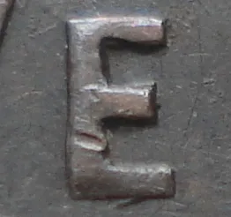 Re-engraved E in NEWF
