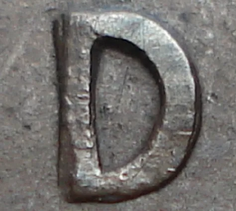 Re-engraved D in LAND