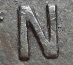 Re-engraved N in NEWF