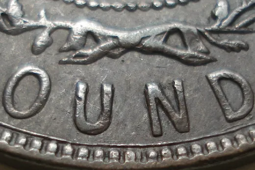 Re-engraved Letters in OUND & Wire Border Spur