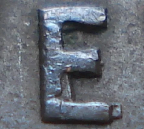 Re-engraved E in NEWF
