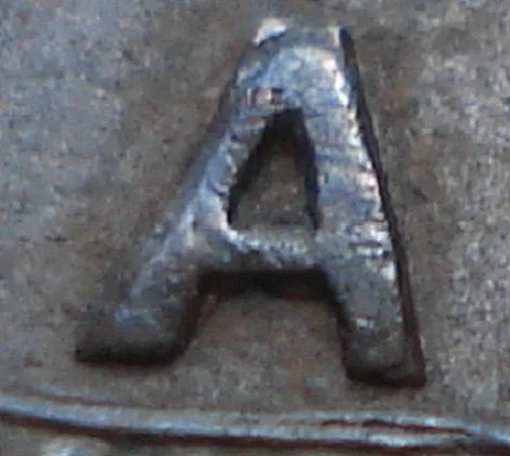 Re-engraved A in LAND
