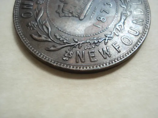 Re-engraved N in NEWF