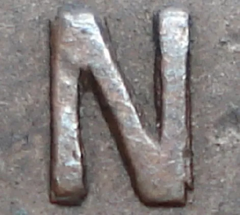 Re-engraved N in ONE