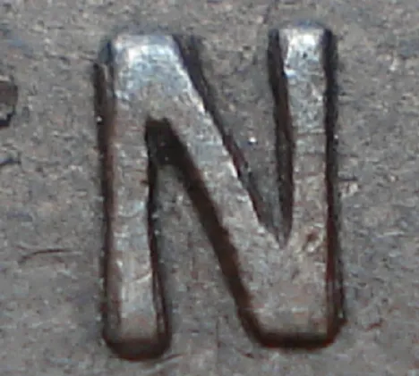 Re-engraved N in NEWF