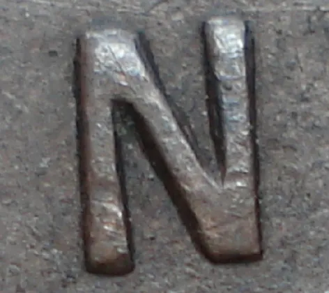 Re-engraved N in OUND