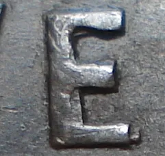 Re-engraved E in NEWF