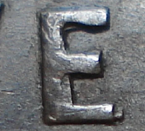 Re-engraved E in NEWF