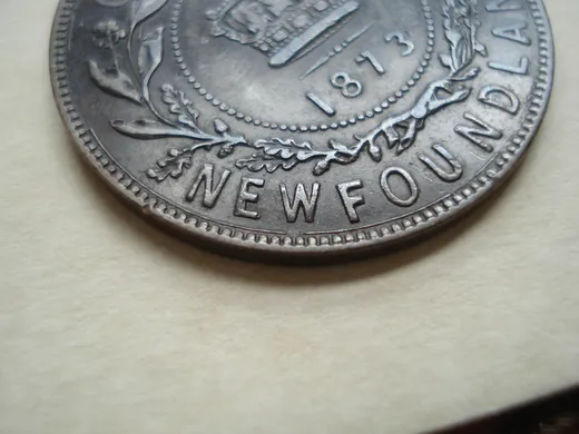 Re-engraved W in NEWF