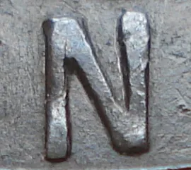 Re-engraved N in LAND