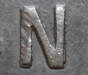 Re-engraved N in ONE
