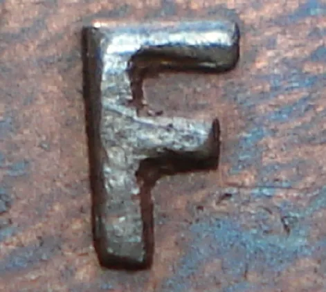 Re-engraved F in NEWF
