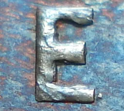 Re-engraved E in ONE