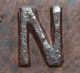 Re-engraved N in NEWF