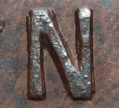 Re-engraved N in NEWF