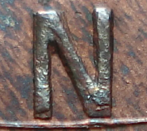 Re-engraved N in LAND
