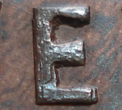 Re-engraved E in NEWF