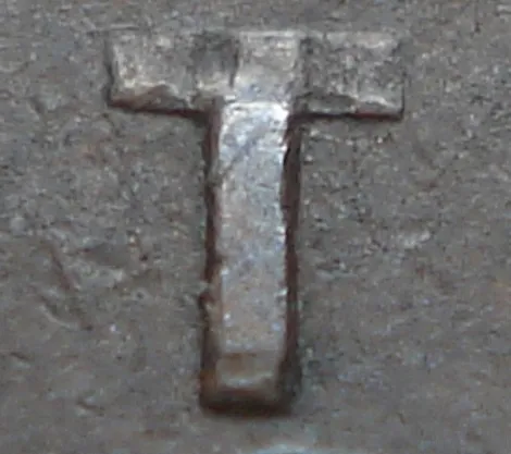 Re-engraved T in CENT