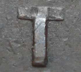 Re-engraved T in CENT