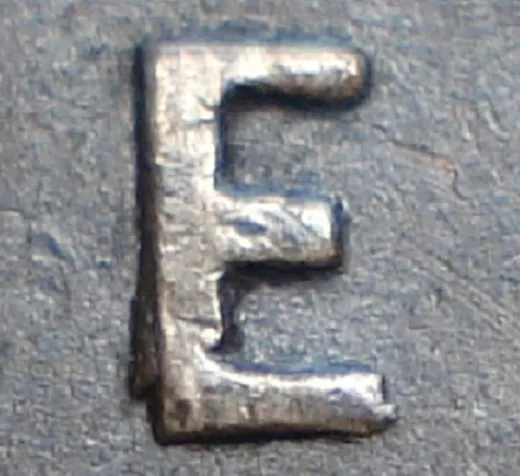 Re-engraved E in ONE