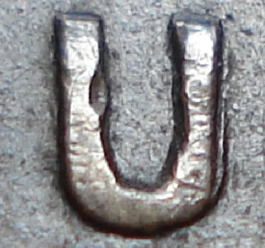 Re-engraved U in OUND