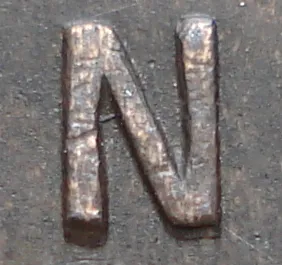 Re-engraved N in ONE