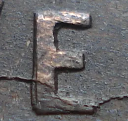 Re-engraved E in NEWF