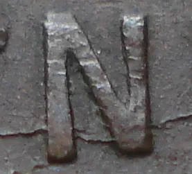 Re-engraved N in NEWF