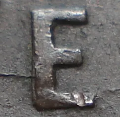 Re-engraved E in NEWF