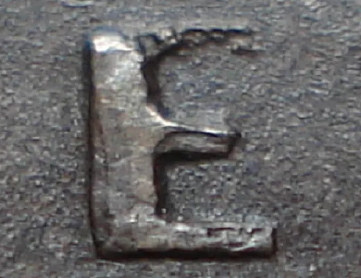 Re-engraved E in NEWF