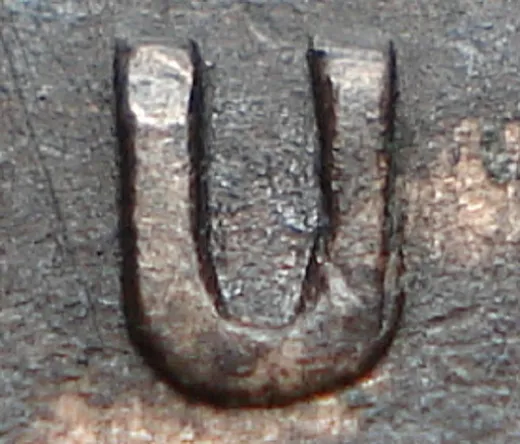 Re-engraved U in OUND