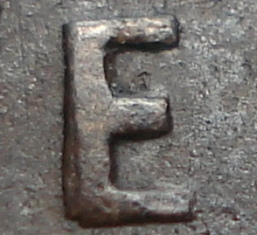 Re-engraved E in NEWF