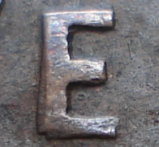 Re-engraved E in NEWF